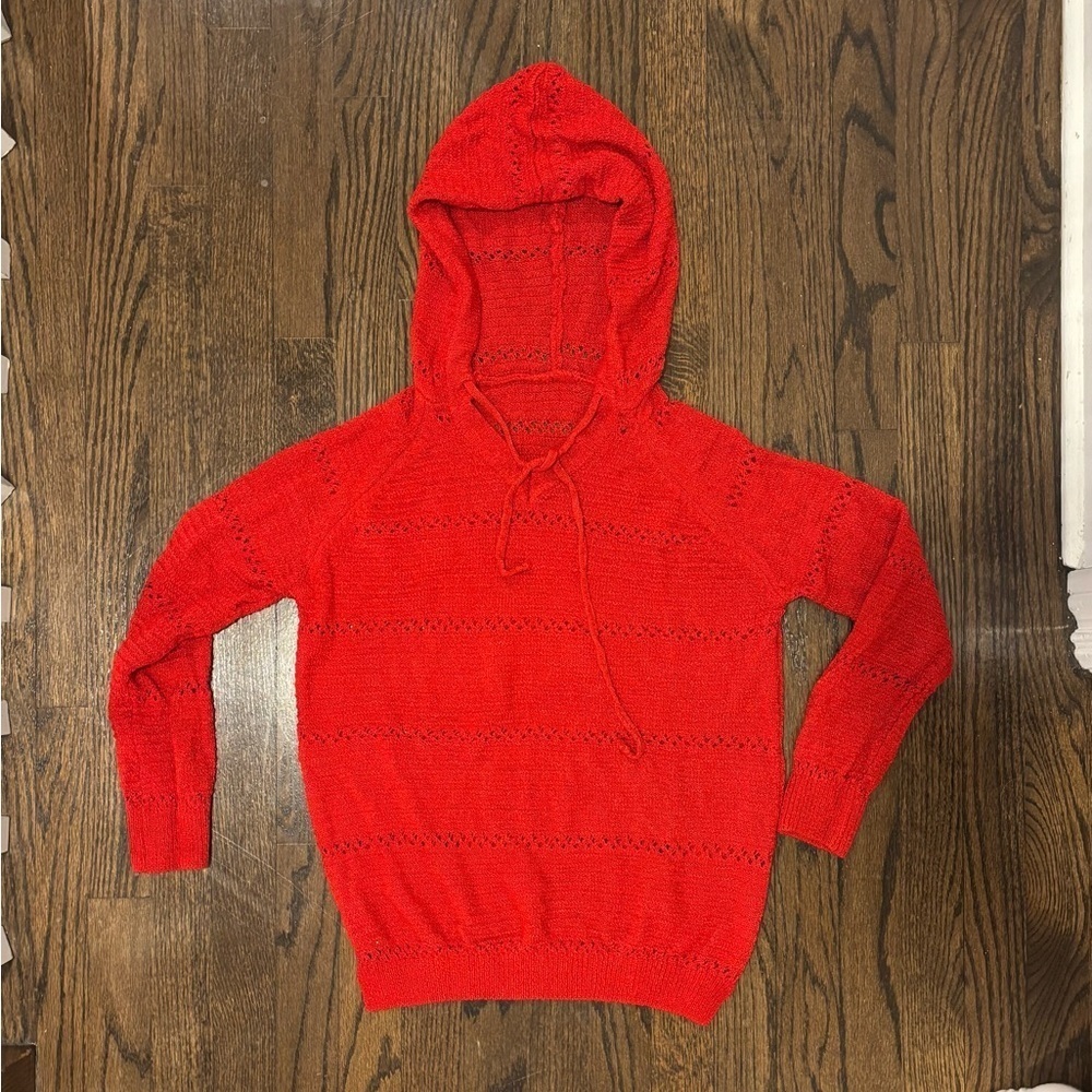 Very pretty red hooded sweater.